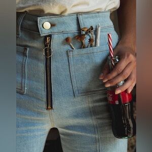 Stoned Immaculate Clothing high rise bell bottom denim pants.